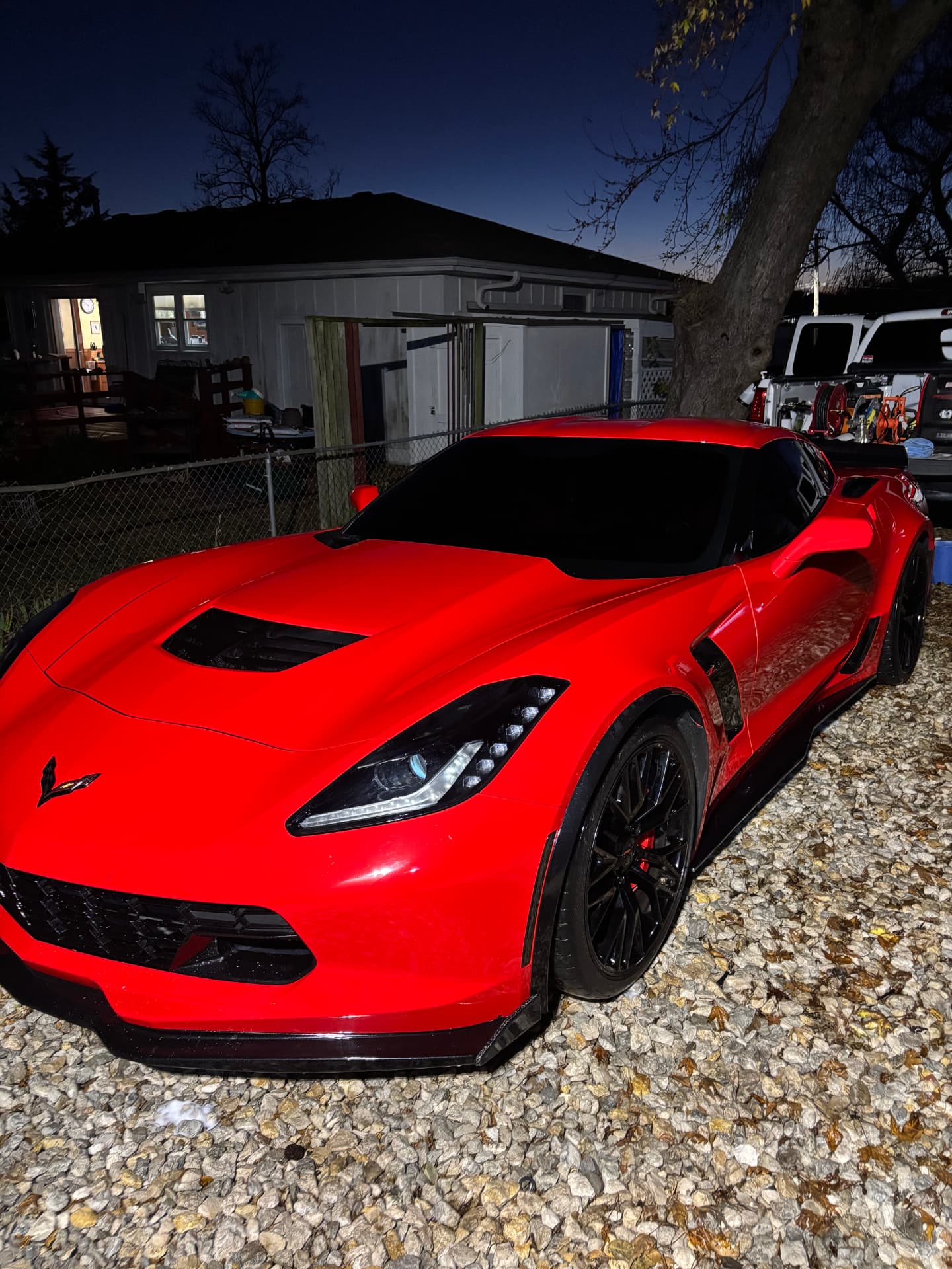 Red Corvette Z06 with a glossy hand-polished finish after an exterior detail