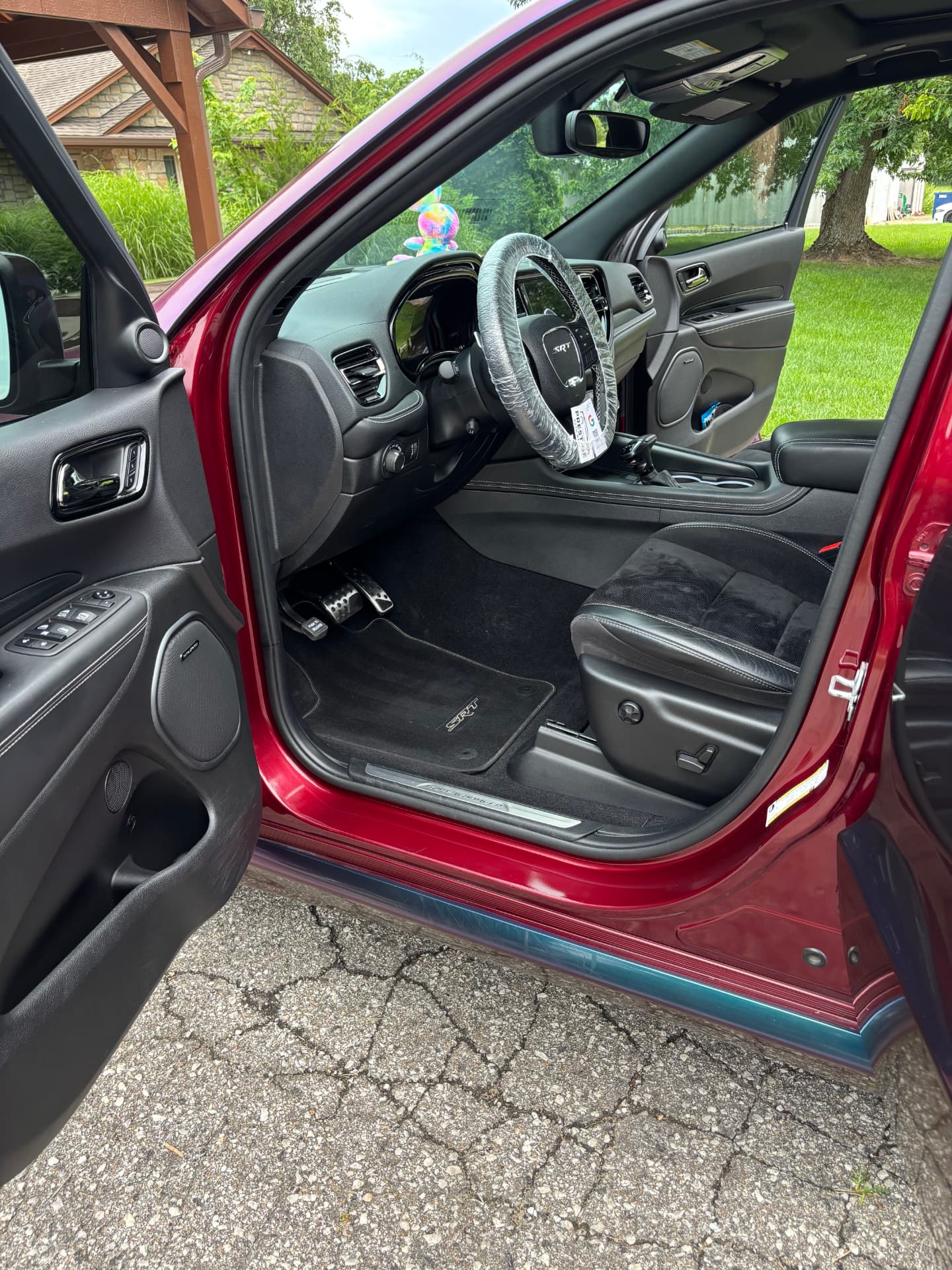 Freshly detailed black interior of a red Dodge Durango SRT